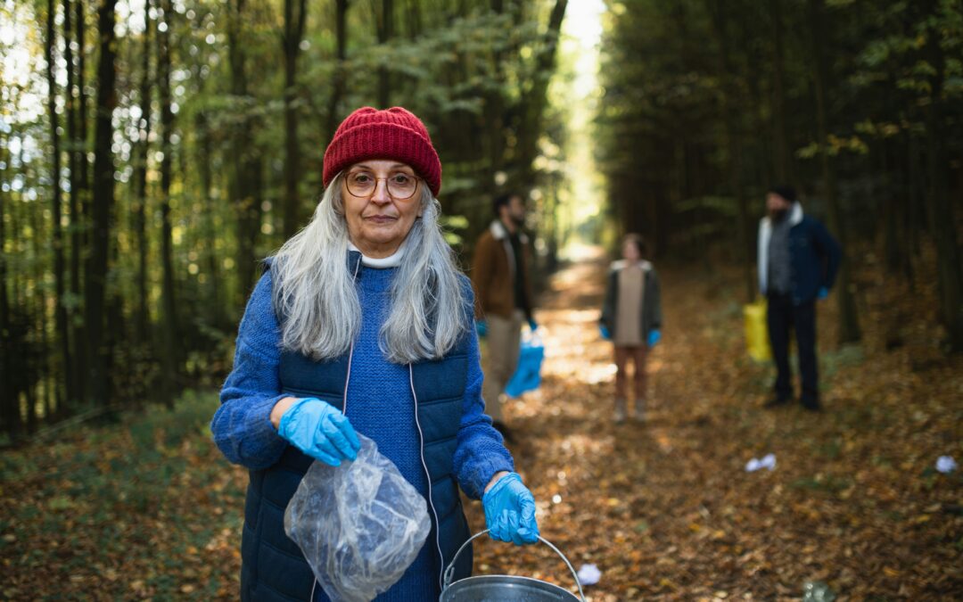 An older woman picking up trash with consistent effort can make a big impact
