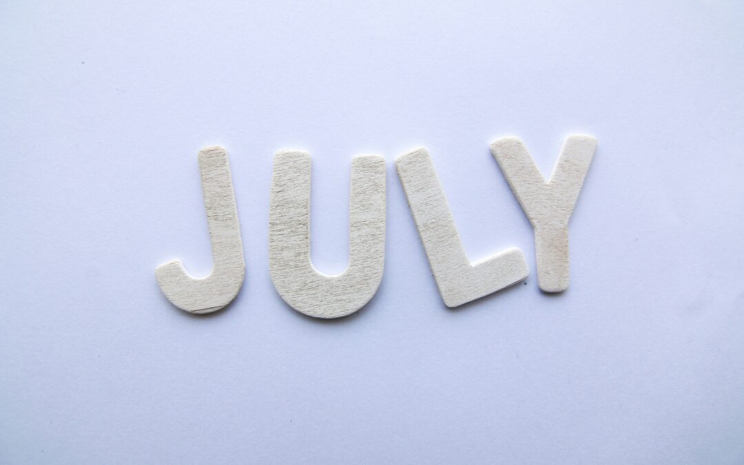 the word July arranged on a solid color background. That means it's time for your midyear check-in.